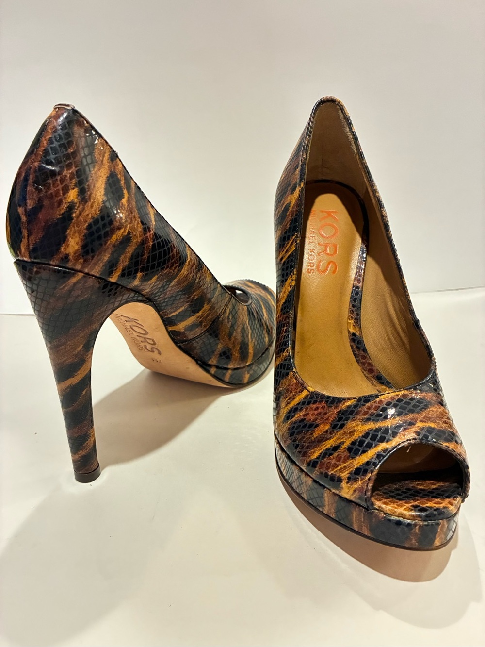 Michael Kors peep toe tiger print stiletto heels. Sz7